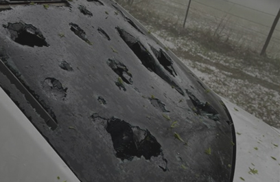 car damaged with hail